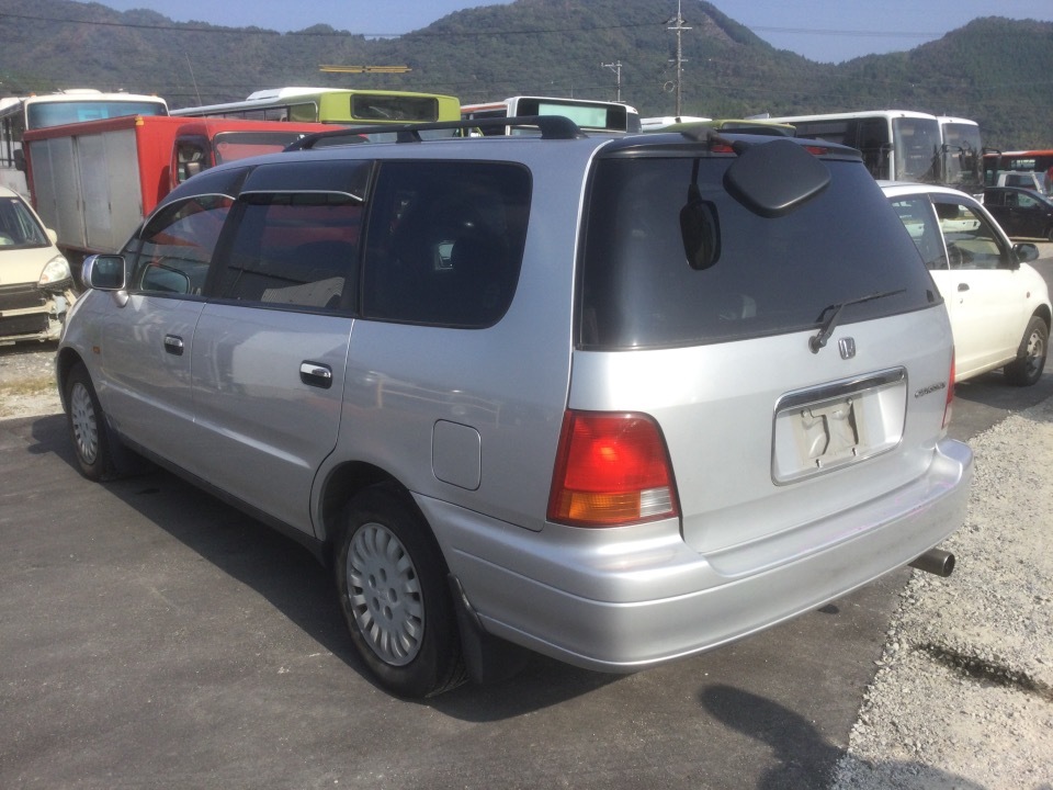 オデッセイ 300 Men's Citizen Eco-Drive® Avion Super Titanium™ Leather Strap Watch